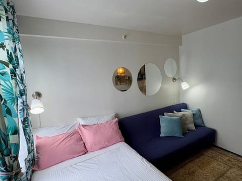 Bed, Living room, Seating area, Bedroom