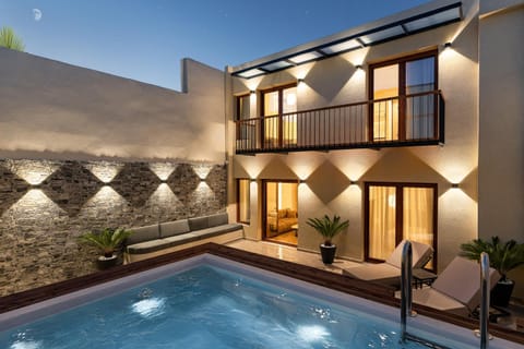 Property building, Patio, Pool view, Swimming pool, sunbed