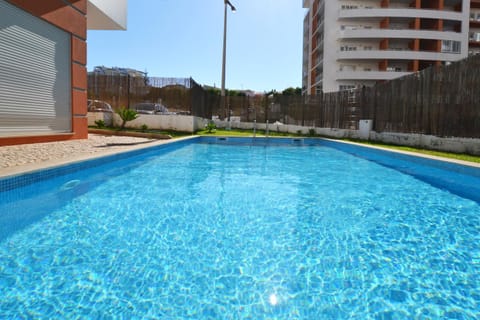 Property building, Facade/entrance, Pool view, Swimming pool, children, older children, Family