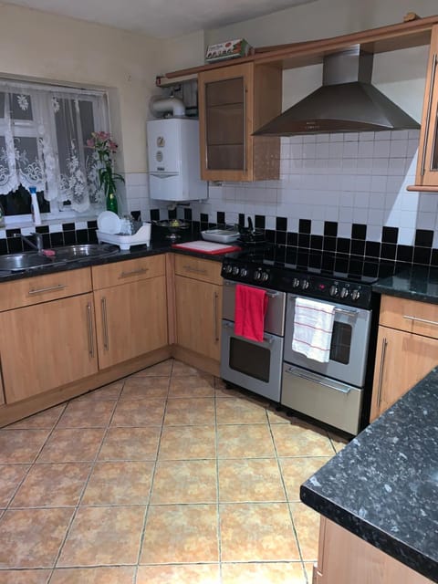 Kitchen or kitchenette, microwave, oven, stove