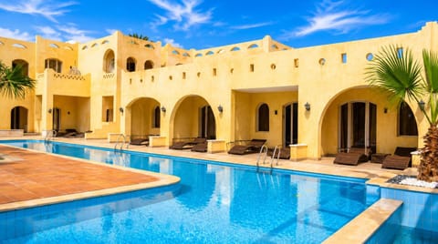 Property building, Patio, Day, Pool view, Swimming pool