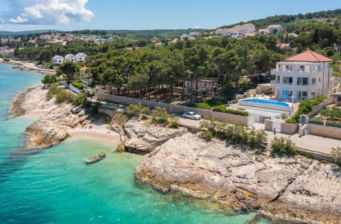 Property building, Bird's eye view, Beach, Swimming pool