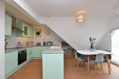 Sea view, dishwasher, microwave, oven, stove, toaster, kitchen