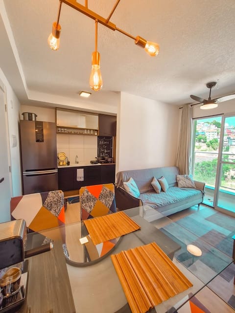 Living room, Seating area, Dining area, stove, kitchen