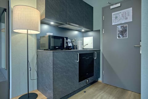 Kitchen or kitchenette, microwave