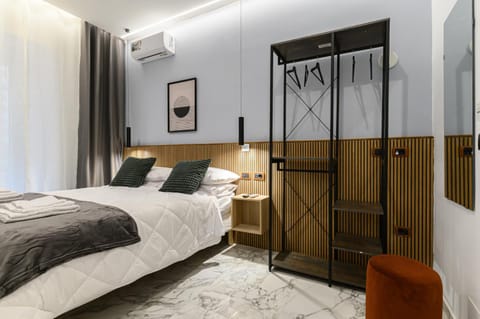 Bed, Photo of the whole room, Bedroom, locker, towels, wardrobe, air conditioner