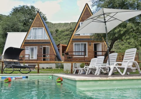 Property building, Patio, Pool view, Swimming pool, sunbed