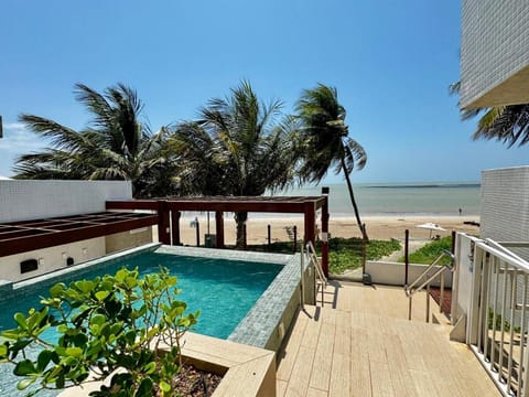 Property building, Day, Natural landscape, View (from property/room), Pool view, Sea view, sunbed
