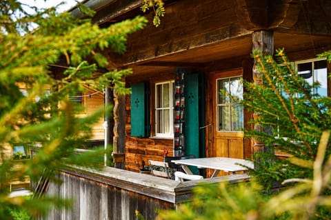 Property building, Patio, Natural landscape, Seating area