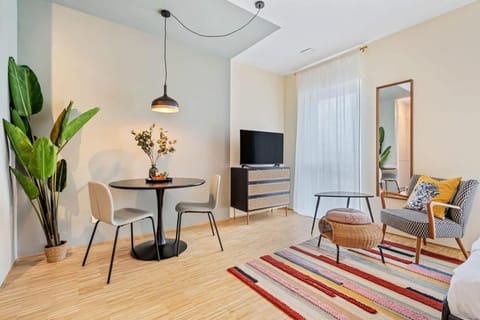 Bed, TV and multimedia, Living room, Seating area, Dining area