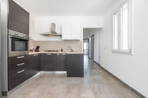 Kitchen or kitchenette, oven, stove