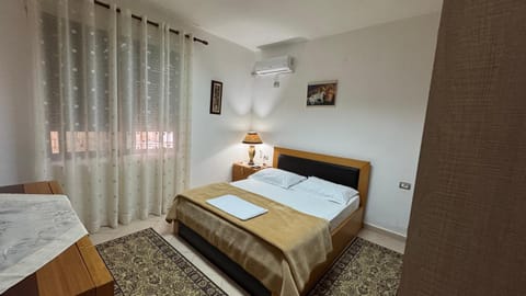 Bed, Photo of the whole room, Bedroom, towels, air conditioner