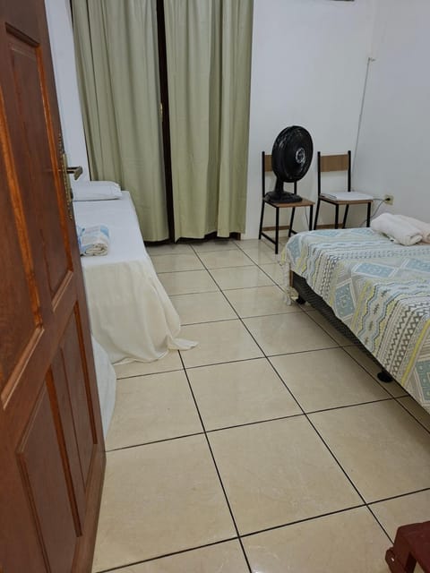 CASA DE HOSPEDAGEM FLORES PARATY 700 METROS DO CENTRO COM CAFÉ da MANHÃ House in Paraty