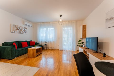Property building, TV and multimedia, View (from property/room), Living room, Seating area