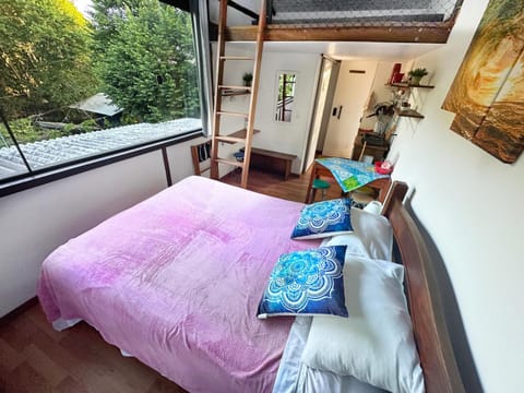Bed, towels, kitchen, air conditioner
