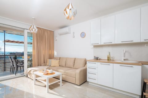 Kitchen or kitchenette, Living room, Dining area, Sea view