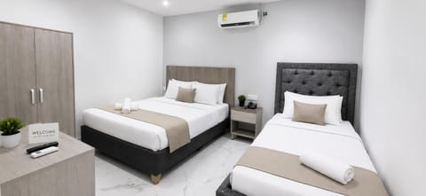 Bed, Photo of the whole room, Bedroom, towels, air conditioner