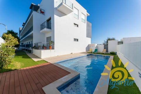 Swimming pool, sunbed