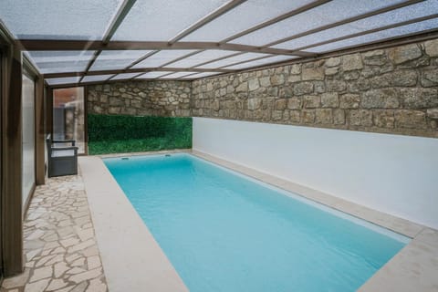 Property building, Living room, Swimming pool