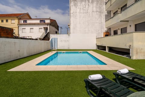 Property building, Living room, Swimming pool