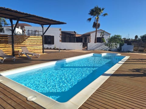 Swimming pool, sunbed
