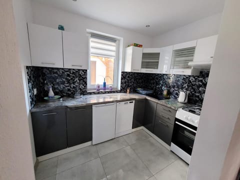 Domki na zielonej łące House in Leba