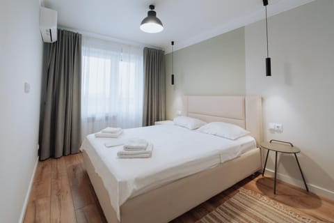 Bed, Photo of the whole room, Bedroom, towels, air conditioner