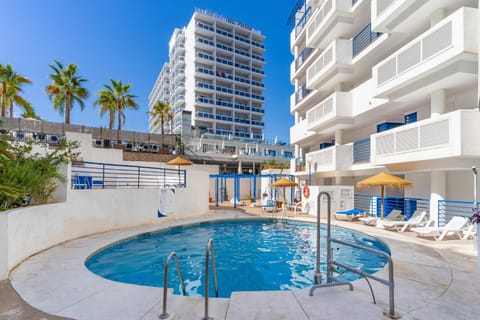 Property building, Living room, Swimming pool