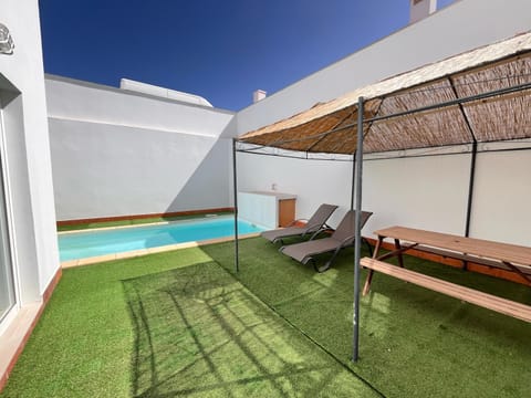 Patio, Day, Garden, Pool view, Swimming pool, sunbed