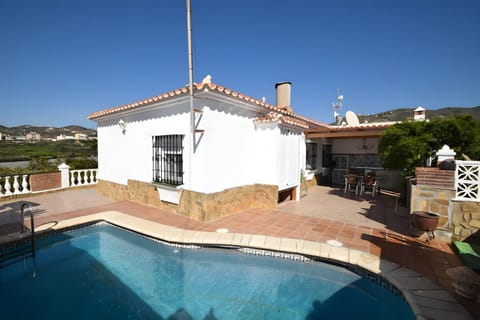 Property building, Living room, Swimming pool