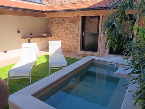 Patio, Day, Pool view, Swimming pool, sunbed