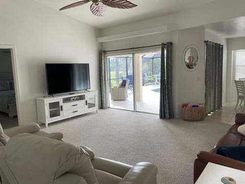 Bright & Airy Canal-Front Retreat With Pool House in Rotonda West