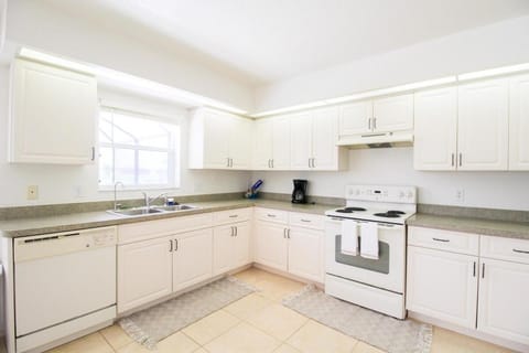 Bright & Airy Canal-Front Retreat With Pool House in Rotonda West