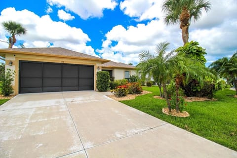 Bright & Airy Canal-Front Retreat With Pool House in Rotonda West