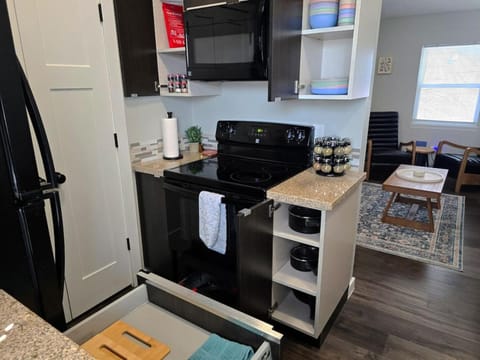 Kitchen or kitchenette, oven, stove
