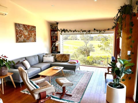 View (from property/room), Living room, Seating area, Garden view