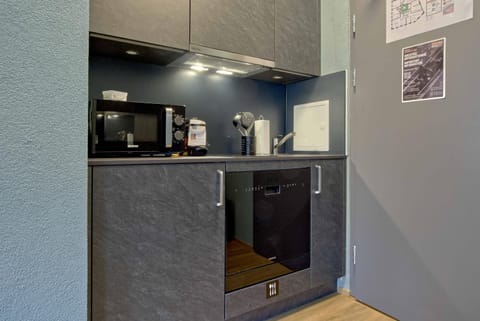 Kitchen or kitchenette, microwave