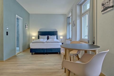 Bed, Living room, Dining area