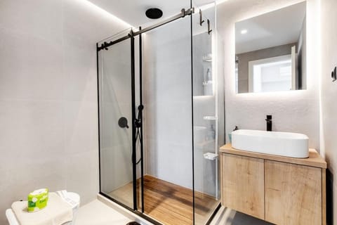 Shower, Toilet, Bathroom, hair dryier, towels