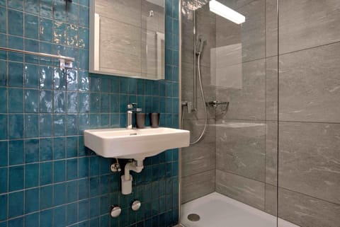 Shower, Bathroom, hair dryier, towels