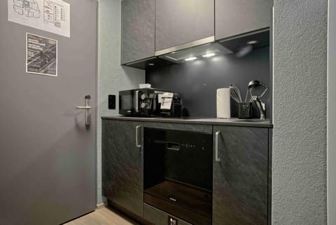 Kitchen or kitchenette, microwave