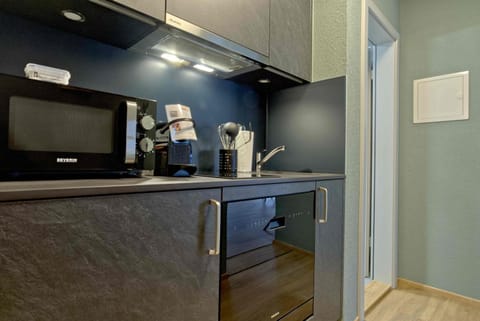 Kitchen or kitchenette, microwave