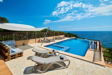 Property building, Living room, Swimming pool