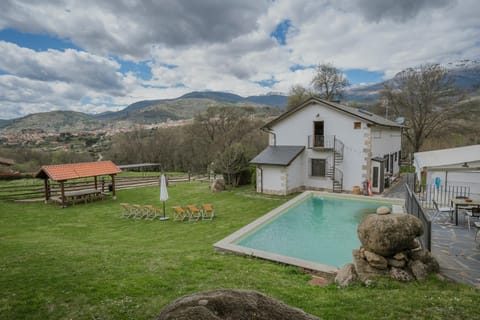 Property building, Living room, Swimming pool