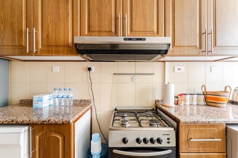 Kitchen or kitchenette, stove, kitchen