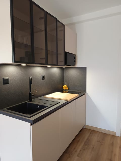 Kitchen or kitchenette, stove