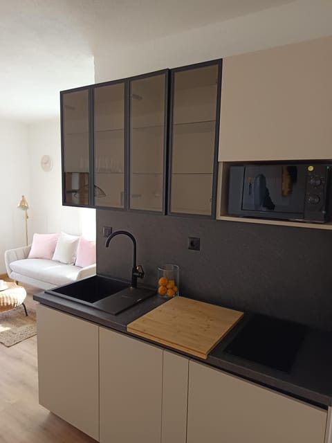 Kitchen or kitchenette, stove