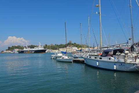 Property building, Restaurant/places to eat, Neighbourhood, Natural landscape, Beach, Shopping Area