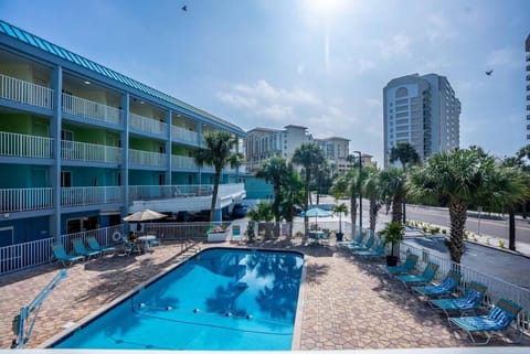 Property building, Day, Pool view, Swimming pool, sunbed