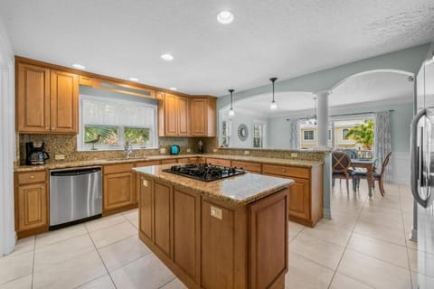 Kitchen or kitchenette, dishwasher, oven, stove